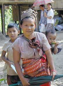 Karen mother carrying child